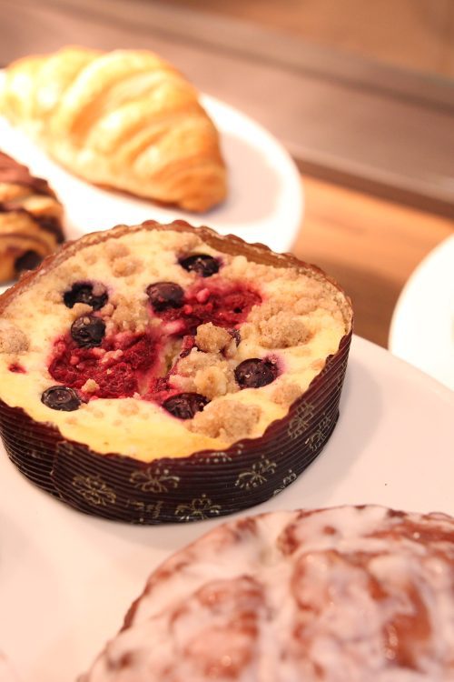 Close-up of assorted baked goods in a pastry case