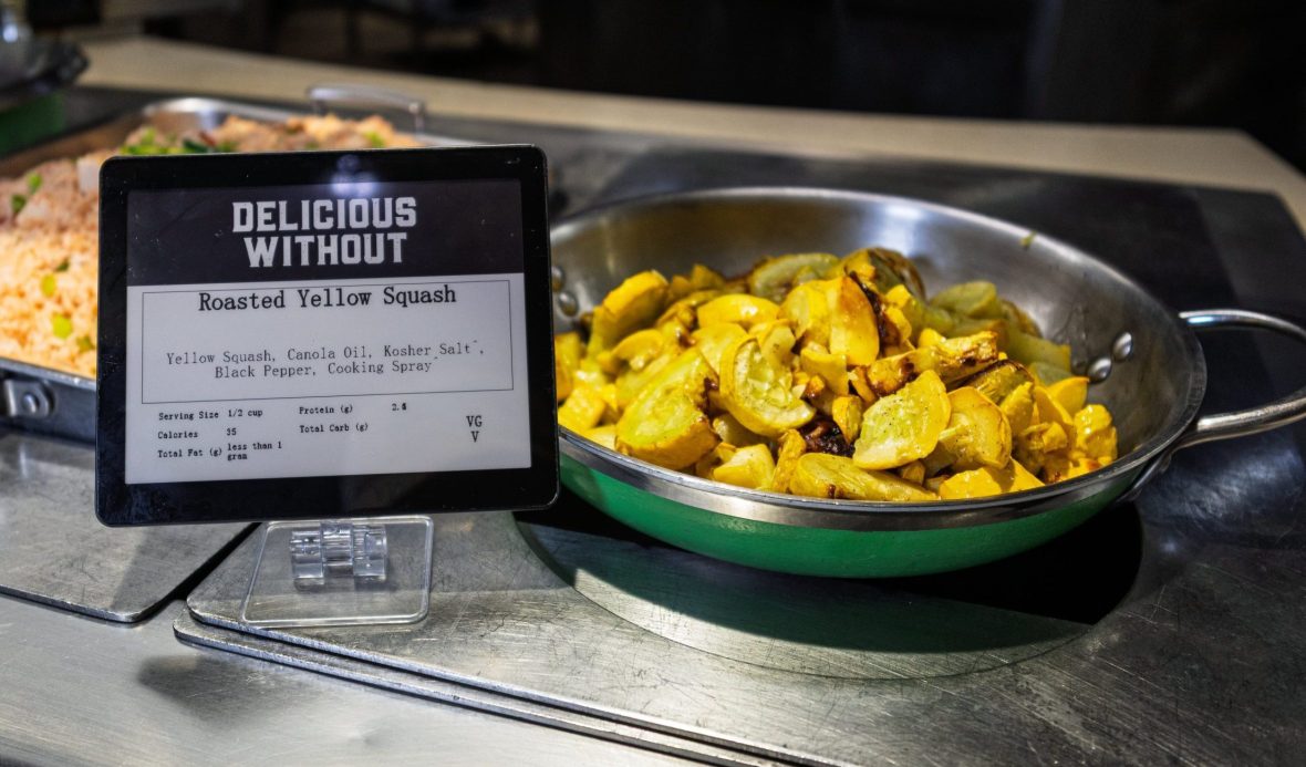 Nutrition info card next to pan of yellow squash