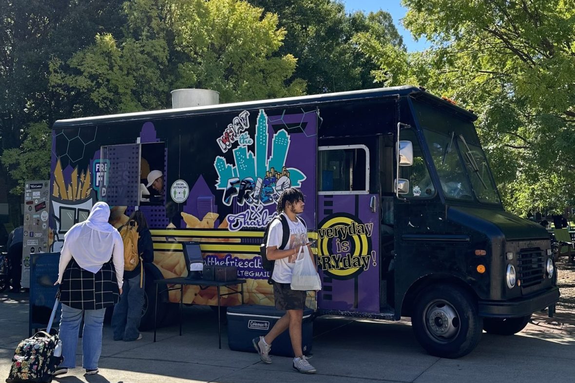 What the fries food truck on campus with people in front of it