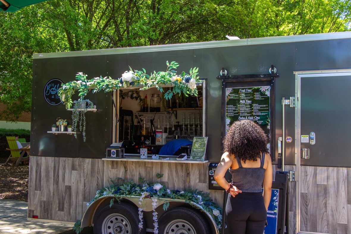 boba food truck with person standing at ordering window