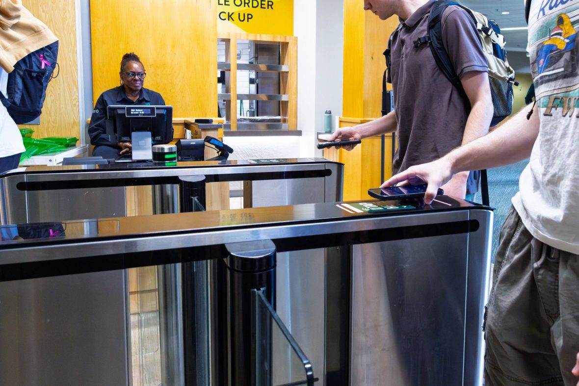 Students using mobile IDs to swipe into dining hall