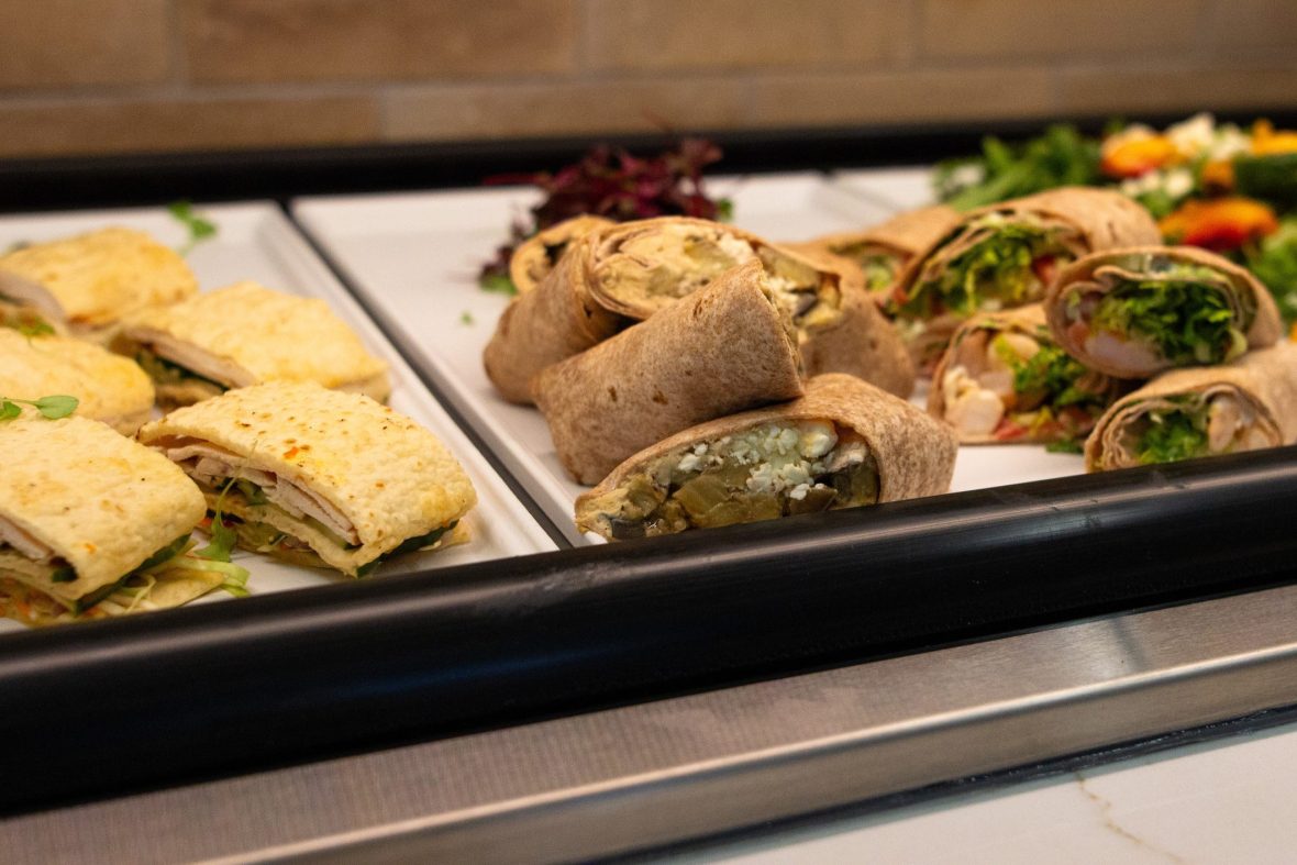wraps cut in half on a buffet-style tray