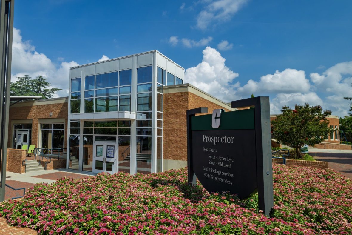Exterior of Prospector building with directory sign